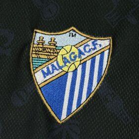 Camiseta Málaga Legado Retro 2025/26 — Detalle de acabados