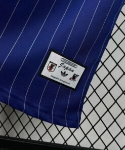 Maglia Japan Home 2024/25 Versione Tifoso dettaglio stemma ricamato