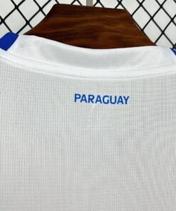 Maglia Paraguay Home 2024/25 Versione Tifoso dettaglio stemma ricamato