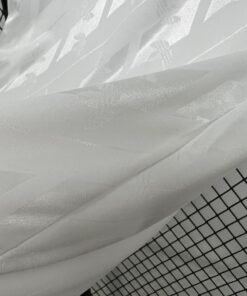 Maglia Real Madrid Home 2026/27 Versione Tifoso dettaglio stemma ricamato