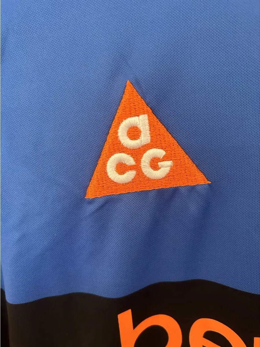 Maglia Inter Fourth dettaglio triangolo arancio