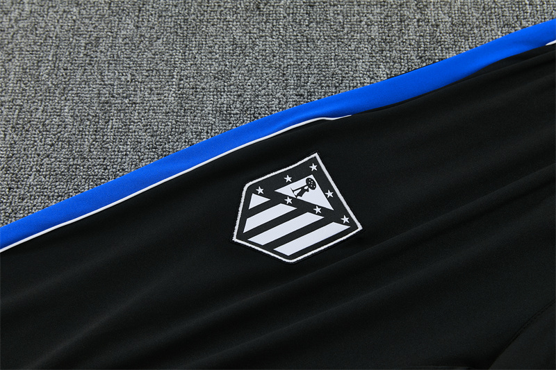Tuta Atletico Madrid dettaglio cerniera alla caviglia