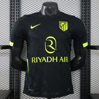 camiseta atletico madrid jugador away 2026/27 vista frontal negra y amarillo flúor
