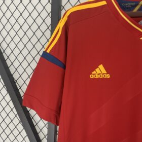 camiseta España 2012 hombro con rayas dorado