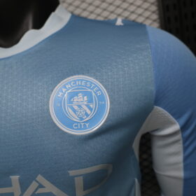 Maglia Manchester City Home Manica Lunga 2026/27 — Dettaglio materiali e logo