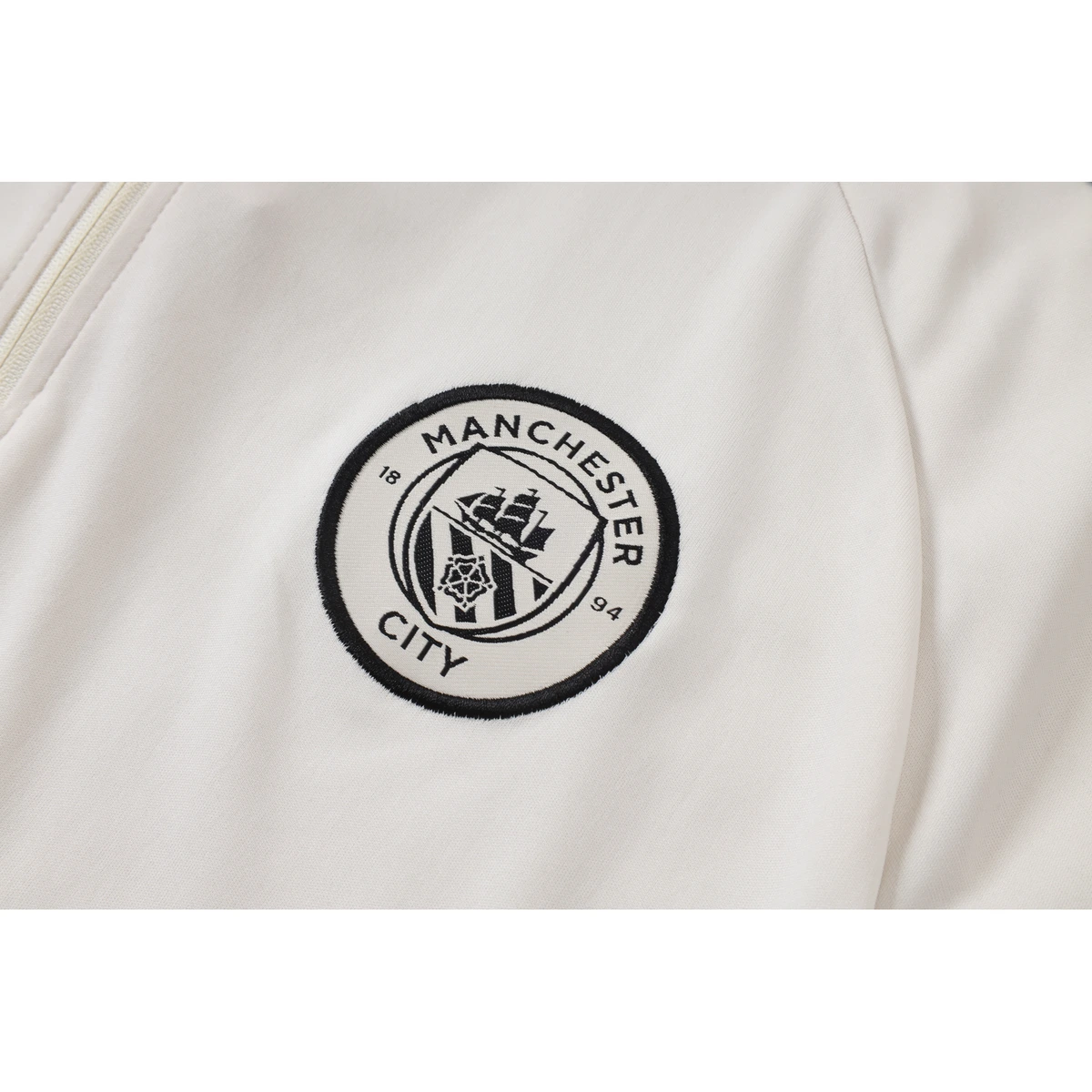 tuta Manchester City 2026/27 stemma
