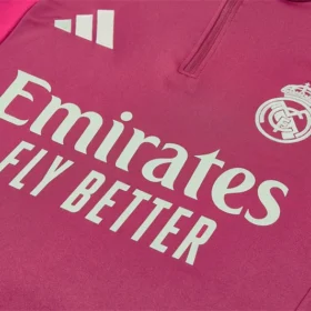 Chándal Real Madrid Niño Fucsia 2026/27 — Detalle de materiales y logo