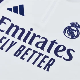 Chándal Real Madrid Blanco y Azul 2026/27 — Detalle de materiales y logo