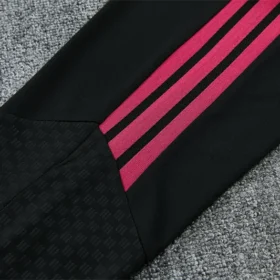 Chándal Real Madrid Negro y Rosa 2026/27 — Detalle de acabados