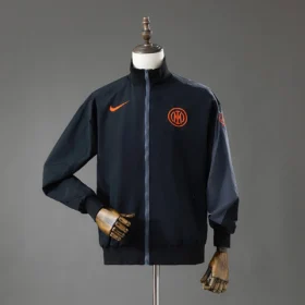 Chaqueta Cortavientos Inter Negra y Naranja 2025/26 — Vista frontal