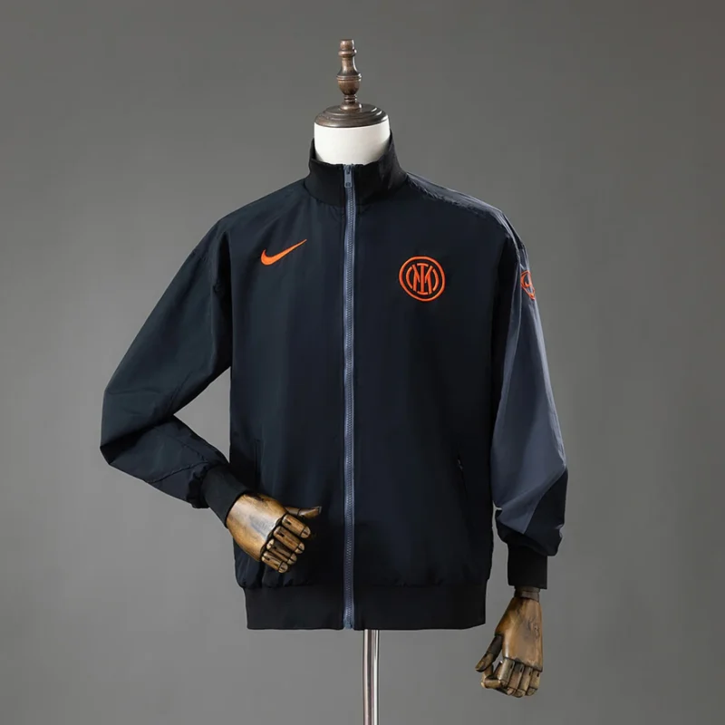 Chaqueta Cortavientos Inter Negra y Naranja 2025/26 – frontal