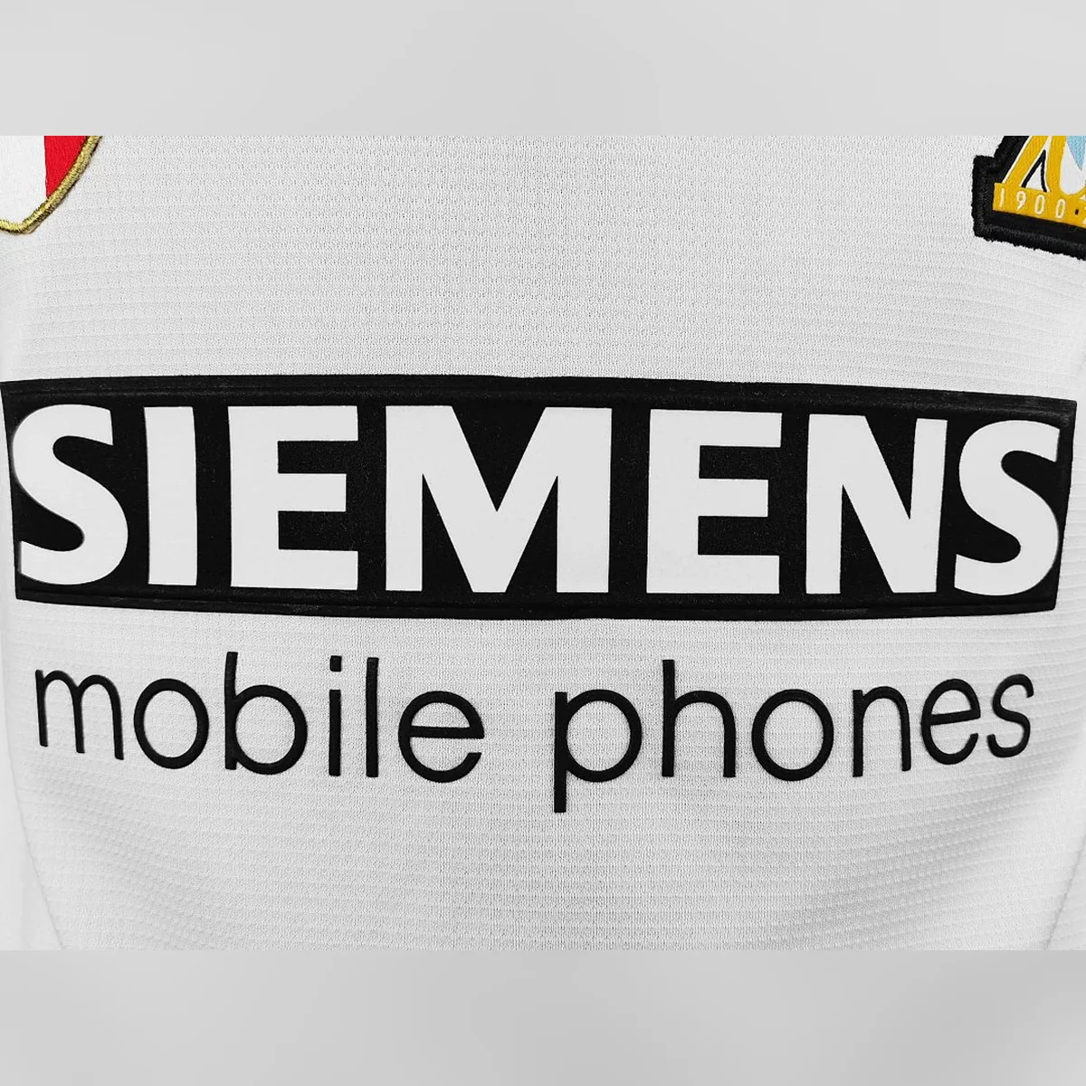 Seconda Maglia Lazio 2000/01 Siemens Retro – dettaglio sponsor e patch scudetto