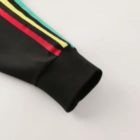 Tuta Giamaica Nera Full Zip con Strisce Tricolori 2026/27 – polsino e strisce tricolori reali