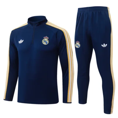 Tuta Real Madrid Blu Mezza Zip Strisce Oro 2026/27