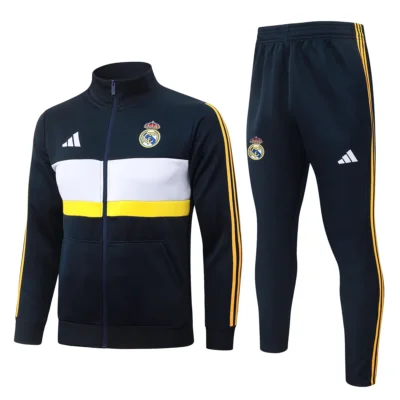 Tuta Real Madrid Blu Navy Fascia Bianca e Gialla 2026/27